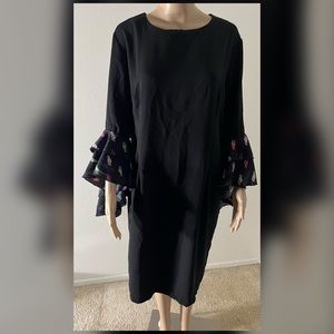 Marina Kaneva Black Dress with Race Car Sleeves